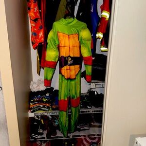 Teenage Mutant Ninja Turtle Raphael M Size 8 Red built in muscles